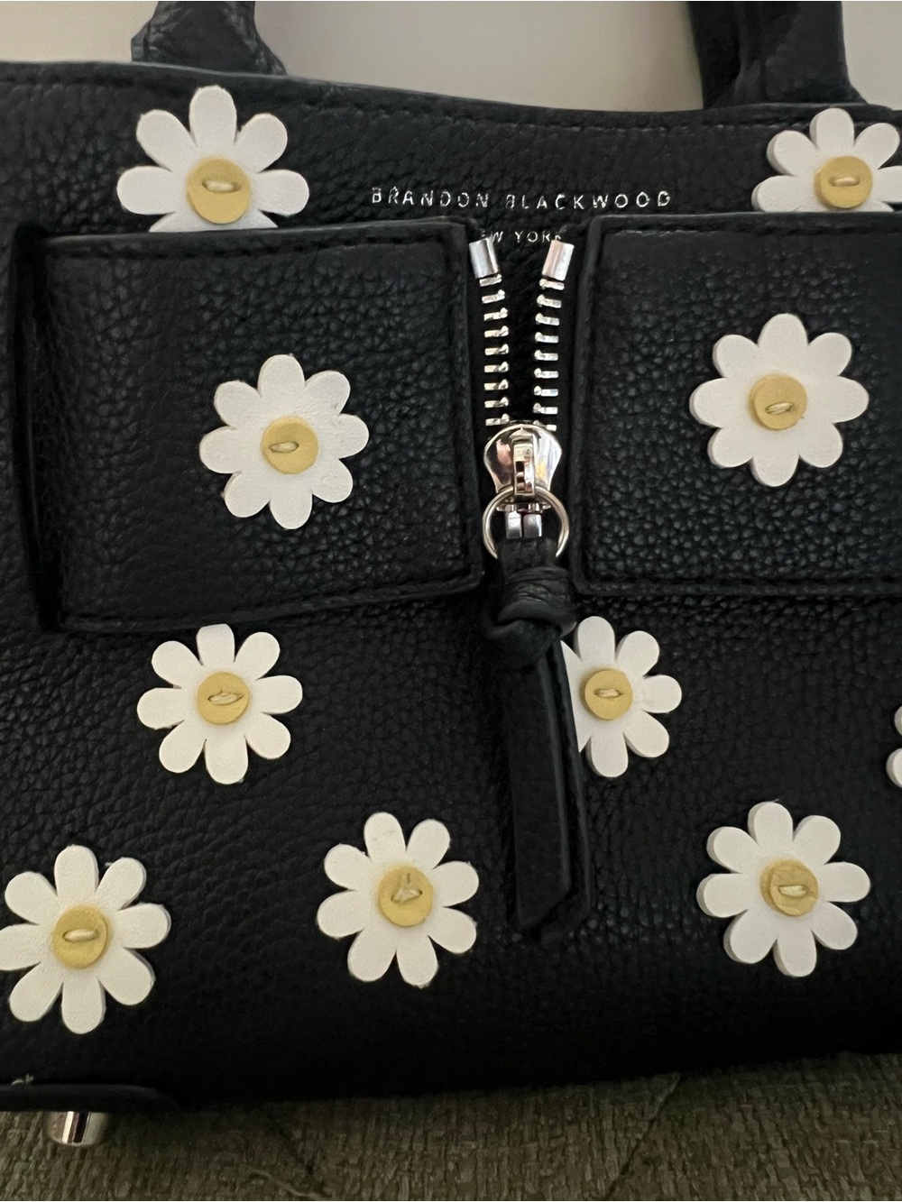Brandon Blackwood Kuei Black Bag with White and Gold Daisy Accents
